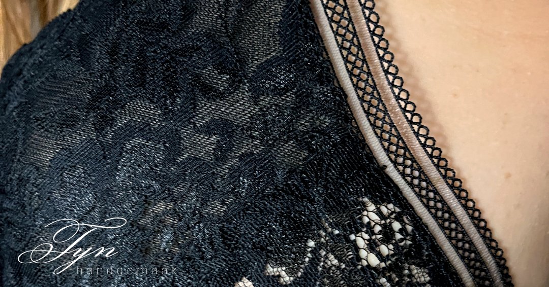 Beaded lace over navy satin