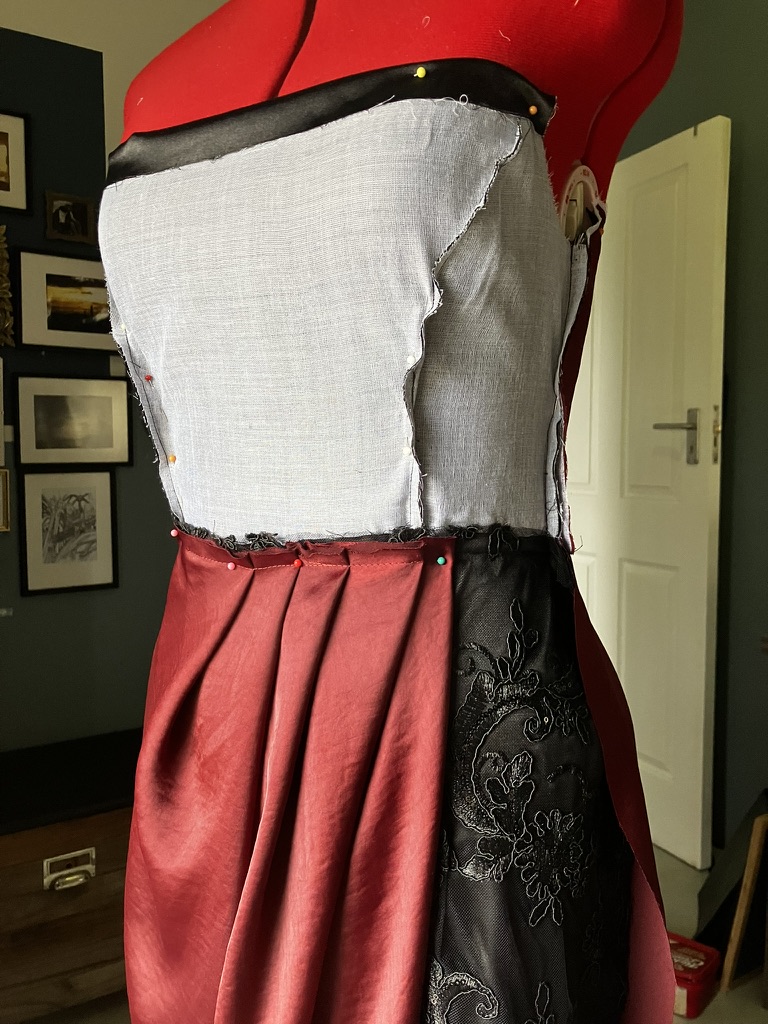 A garment being fitted in the studio