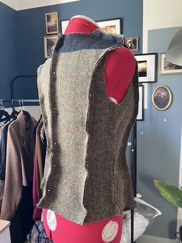 Waistcoat beside the studio rail