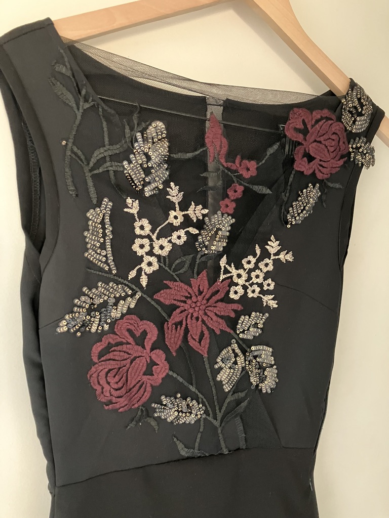 Rose embroidery across a reworked bodice