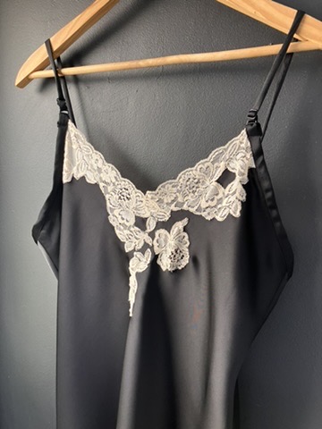 Ivory bridal robe on a hanger